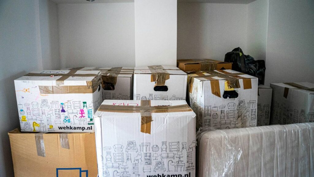 A photo of several sizeable cardboard boxes